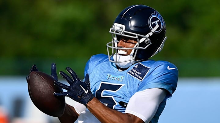 Tennessee Titans wide receiver Elic Ayomanor (5) makes a catch during an NFL football training camp practice at Ascension Saint Thomas Sports Park Saturday, Aug. 2, 2025, in Nashville, Tenn.