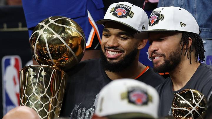 New York Knicks center Karl-Anthony Towns (L) holds the Larry O'Brien championship trophy as Knicks guard Jalen Brunson (R) holds the Finals MVP trophy after game five of the 2026 NBA Finals against the San Antonio Spurs at Frost Bank Center. Mandatory Credit: Geoff Burke-Imagn Images New York Knicks center Karl-Anthony Towns (L) holds the Larry O'Brien championship trophy as Knicks guard Jalen Brunson (R) holds the Finals MVP trophy after game five of the 2026 NBA Finals against the San Antonio Spurs at Frost Bank Center. Mandatory Credit: Geoff Burke-Imagn Images