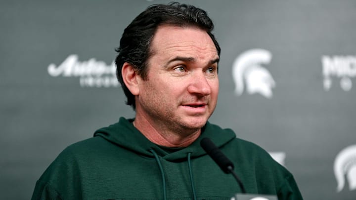 Michigan State coach Jonathan Smith talks the media on the first national signing day for college