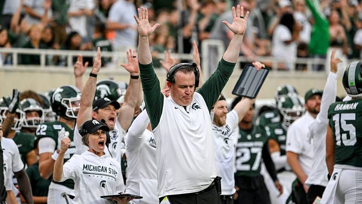 Michigan State’s head coach Pat Fitzgerald celebrates after a touchdown under review was upheld during the third quarter against Illinois on Saturday, Oct. 10, 2026, at Spartan Stadium in East Lansing. Michigan State’s head coach Pat Fitzgerald celebrates after a touchdown under review was upheld during the third quarter against Illinois on Saturday, Oct. 10, 2026, at Spartan Stadium in East Lansing.