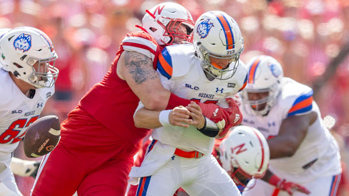 Nebraska defensive lineman Riley Van Poppel forces a fumble from Houston Christian's Jake Weir.