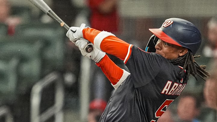 Sep 23, 2025; Cumberland, Georgia, USA; Washington Nationals shortstop CJ Abrams (5) hits a single to drive in a run against the Atlanta Braves during the third inning at Truist Park. Mandatory Credit: Dale Zanine-Imagn Images