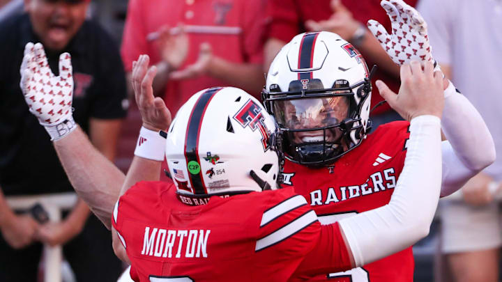 Texas Tech's Coy Eakin celebrates his touchdown catch with Behren Morton (2) against Arkansas-Pine Bluff during a non-conference football game, Saturday, August 30, 2025, at Jones AT&T Stadium.