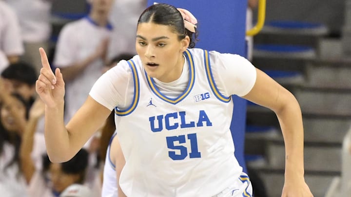 Feb 20, 2025; Los Angeles, California, USA; UCLA Bruins center Lauren Betts (51) celebrates scoring in the first quarter against the Illinois Fighting Illini at Pauley Pavilion presented by Wescom. Mandatory Credit: Robert Hanashiro-Imagn Images