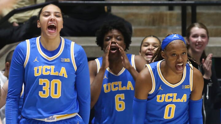 UCLA Bruins forward Timea Gardiner (30), UCLA Bruins forward Zania Socka-Nguemen (6) and UCLA Bruins forward Janiah Barker (0) react after three-pointer Tuesday, Jan. 7, 2025, during NCAA women’s basketball game against the Purdue Boilermakers at Mackey Arena in West Lafayette, Ind.