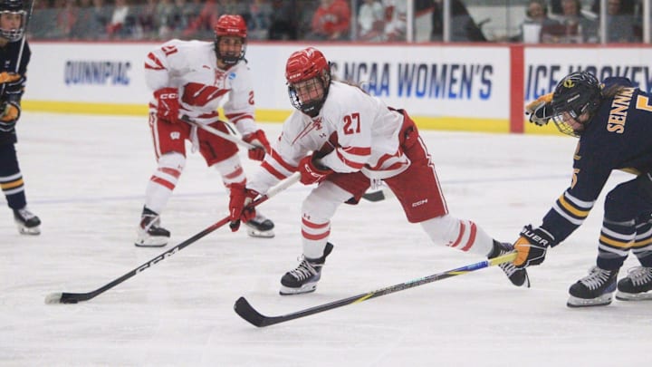 Wisconsin's Kirsten Simms weaves through Quinnipiac defenders during a NCAA regional final Saturday March 14, 2026 at LaBahn Arena in Madison, Wis. Wisconsin's Kirsten Simms weaves through Quinnipiac defenders during a NCAA regional final Saturday March 14, 2026 at LaBahn Arena in Madison, Wis.