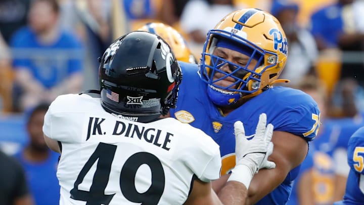 Sep 9, 2023; Pittsburgh, Pennsylvania, USA; Pittsburgh Panthers offensive lineman Branson Taylor (78) blocks against Cincinnati Bearcats linebacker Jack Dingle (49) during the first quarter at Acrisure Stadium. Mandatory Credit: Charles LeClaire-Imagn Images Sep 9, 2023; Pittsburgh, Pennsylvania, USA; Pittsburgh Panthers offensive lineman Branson Taylor (78) blocks against Cincinnati Bearcats linebacker Jack Dingle (49) during the first quarter at Acrisure Stadium. Mandatory Credit: Charles LeClaire-Imagn Images