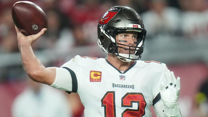Tampa Bay Buccaneers quarterback Tom Brady (12) throws the ball against the Arizona Cardinals at State Farm Stadium in Glendale on Dec. 25, 2022. Tampa Bay Buccaneers quarterback Tom Brady (12) throws the ball against the Arizona Cardinals at State Farm Stadium in Glendale on Dec. 25, 2022.