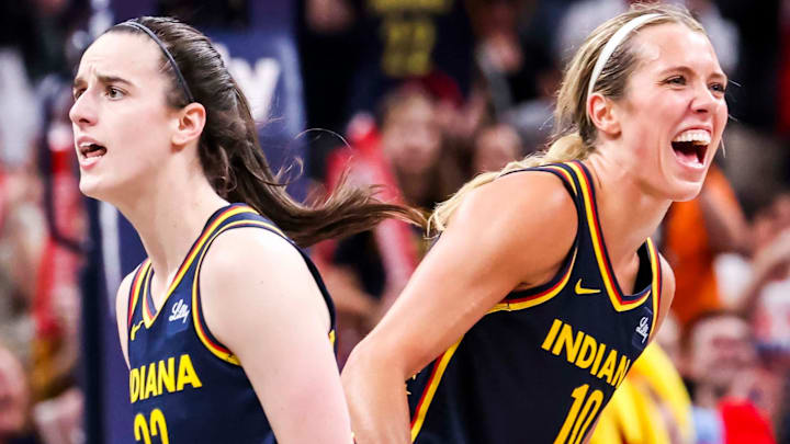Indiana Fever guard Caitlin Clark (22) and Indiana Fever guard Lexie Hull (10) celebrate Saturday, June 14, 2025, during a game between the Indiana Fever and the New York Liberty at Gainbridge Fieldhouse in Indianapolis. The Indiana Fever defeated the New York Liberty, 102-88.