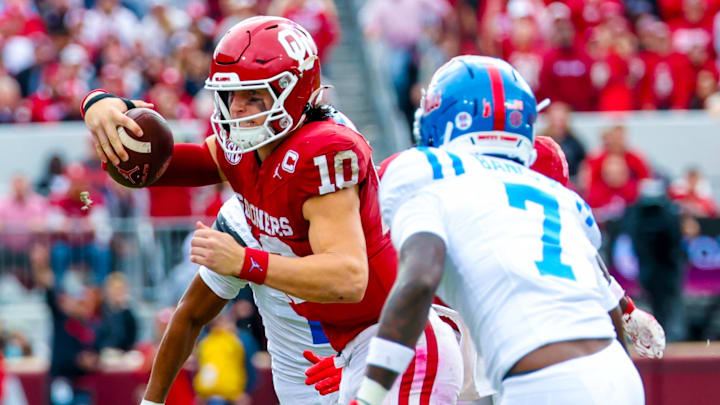 Oklahoma quarterback John Mateer carries the ball against Ole Miss.