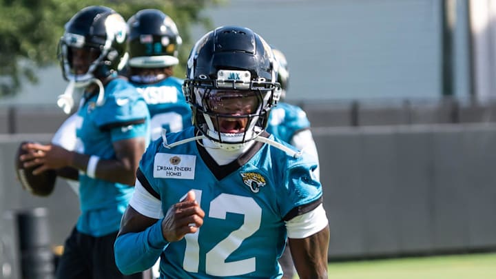 Jacksonville Jaguars wide receiver Travis Hunter (12) runs a passing drill during the Jacksonville Jaguars’ third mandatory minicamp Thursday June 12, 2025 at the Miller Electric Center in Jacksonville, Fla. [Doug Engle/Florida Times-Union]