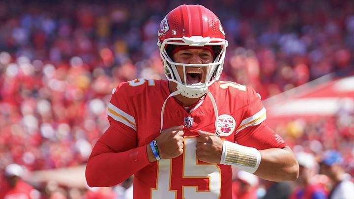 Aug 17, 2024; Kansas City, Missouri, USA; Kansas City Chiefs quarterback Patrick Mahomes (15) celebrates toward fans against the Detroit Lions prior to the game at GEHA Field at Arrowhead Stadium. Mandatory Credit: Denny Medley-Imagn Images