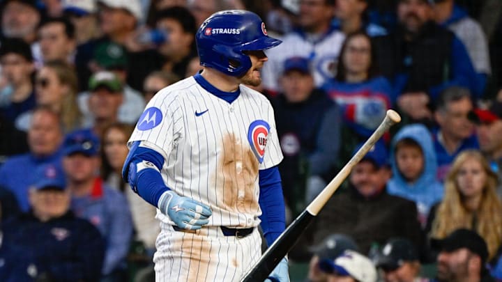 Oct 8, 2025; Chicago, Illinois, USA; Chicago Cubs left fielder Ian Happ (8) reacts to striking out against the Milwaukee Brewers in the fifth inning during game three of the NLDS round for the 2025 MLB playoffs at Wrigley Field. Mandatory Credit: Matt Marton-Imagn Images