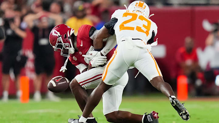 Alabama wide receiver Lotzeir Brooks (17) drops a pass while defended by Tennessee defensive back Boo Carter (23) during a college football game between Tennessee and Alabama at Bryant-Denny Stadium in Tuscaloosa, Ala., on Oct. 18, 2025.