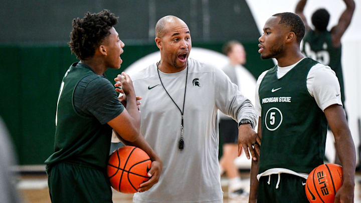 Michigan State's assistant coach Thomas Kelley, center, talks with Jeremy Fears Jr., left, and Tre Holloman in practice during men's basketball media day on Thursday, Oct. 17, 2024, at the Breslin Center in East Lansing.