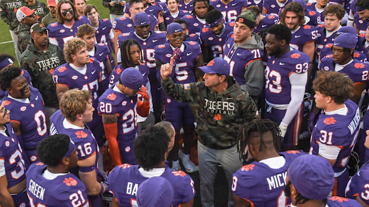 Nov 23, 2024; Clemson, South Carolina, USA; Clemson Tigers head coach Dabo Swinney talks to players before kickoff against The Citadel Bulldogs at Memorial Stadium. Mandatory Credit: Ken Ruinard-Imagn Images