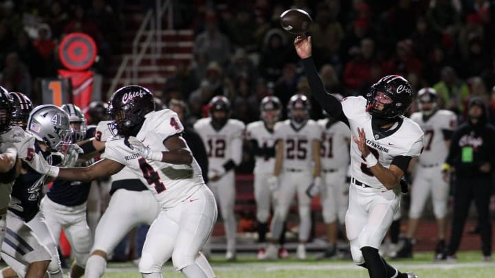 Bellefontaine's Tavien St. Clair throws to the outside against Granville in the Division III, Region 11 semifinal on Friday, November 11, 2023, at London High School.