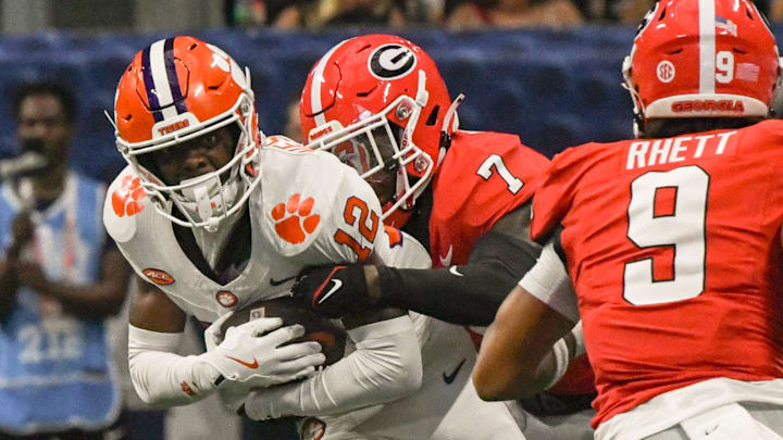  Georgia defensive back Daniel Harris tackles a Clemson receiver during the 2024 season 