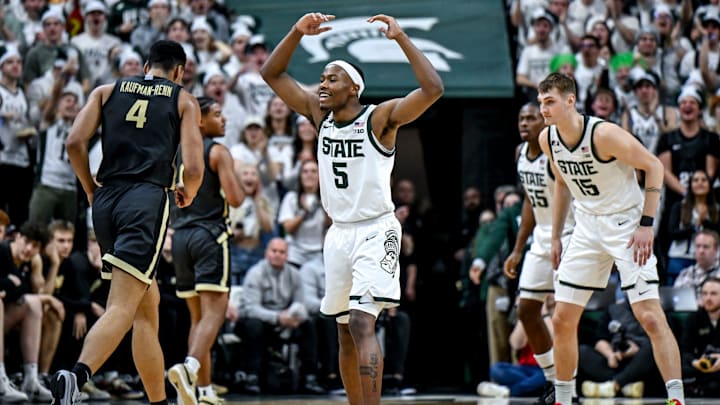 Michigan State's Tre Holloman celebrates after a Spartans score against Purdue during the second half on Tuesday, Feb. 18, 2025, at the Breslin Center in East Lansing.