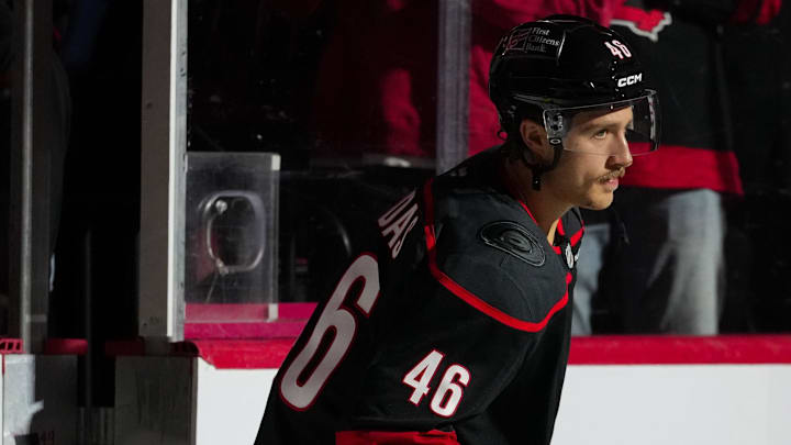Nov 26, 2025; Raleigh, North Carolina, USA; Carolina Hurricanes center Justin Robidas (46) skates onto the ice before the start of the game against the New York Rangers at Lenovo Center. Mandatory Credit: James Guillory-Imagn Images