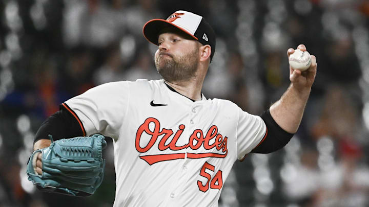 May 29, 2024; Baltimore, Maryland, USA;  Baltimore Orioles relief pitcher Danny Coulombe (54) throws a eighth inning pitch against the Boston Red Sox at Oriole Park at Camden Yards.