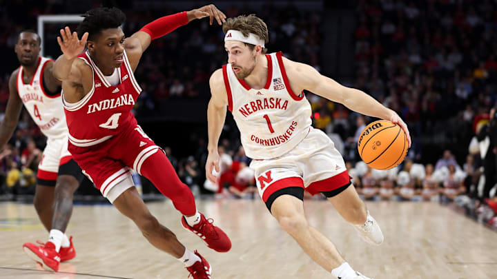 Mar 15, 2024; Minneapolis, MN, USA; Nebraska Cornhuskers guard Sam Hoiberg (1) works around Indiana Hoosiers forward Anthony Walker (4) during the first half at Target Center. 