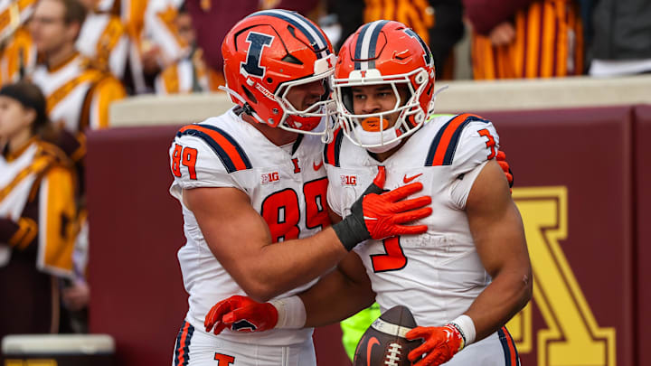 Nov 4, 2023; Minneapolis, Minnesota, USA; Illinois Fighting Illini running back Kaden Feagin (3) celebrates his touchdown with tight end Tip Reiman (89) during the second half against the Minnesota Golden Gophers at Huntington Bank Stadium. Mandatory Credit: Matt Krohn-Imagn Images