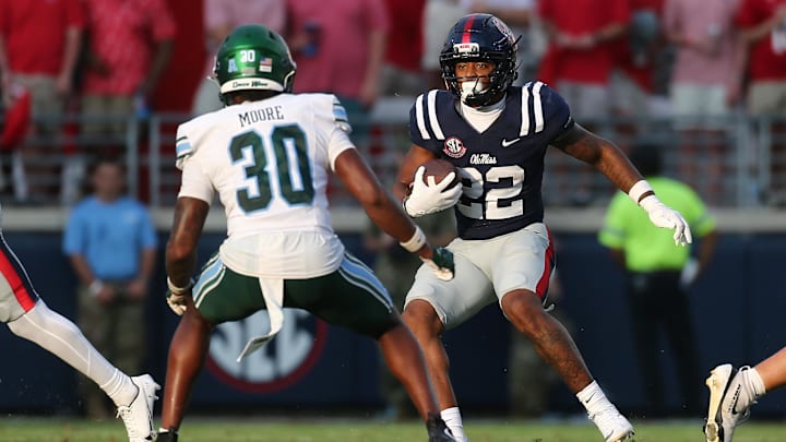 Sep 20, 2025; Oxford, Mississippi, USA; Mississippi Rebels running back Logan Diggs (22) runs the ball during the fourth quarter against the Tulane Green Wave at Vaught-Hemingway Stadium. Mandatory Credit: Petre Thomas-Imagn Images Sep 20, 2025; Oxford, Mississippi, USA; Mississippi Rebels running back Logan Diggs (22) runs the ball during the fourth quarter against the Tulane Green Wave at Vaught-Hemingway Stadium. Mandatory Credit: Petre Thomas-Imagn Images