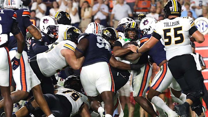 Oct 18, 2025; Auburn, Alabama, USA;  Missouri Tigers running back Jamal Roberts (20) is stopped short of the goal line during the second overtime against the Auburn Tigers at Jordan-Hare Stadium. Mandatory Credit: John Reed-Imagn Images