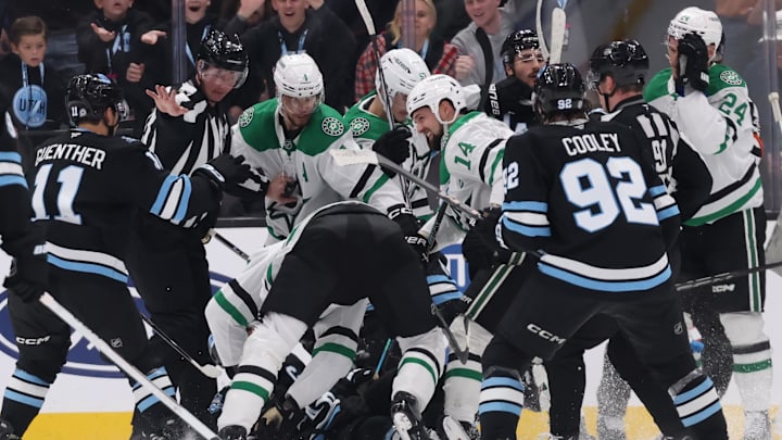 Dec 23, 2024; Salt Lake City, Utah, USA; The Utah Hockey Club and Dallas Stars fight during the third period at Delta Center. Mandatory Credit: Rob Gray-Imagn Images