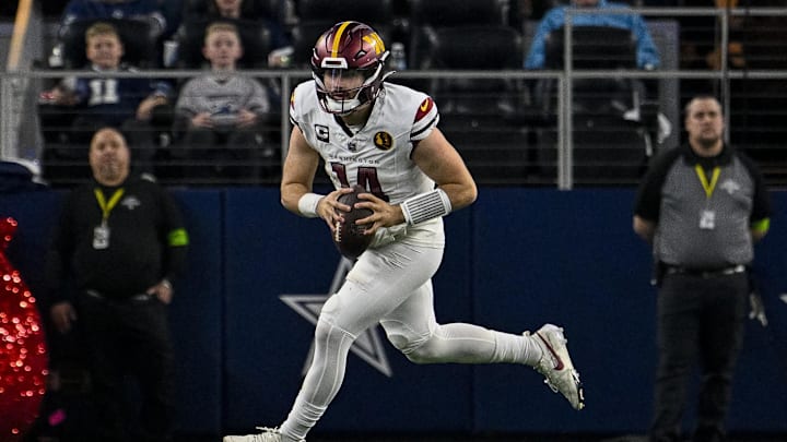 Nov 23, 2023; Arlington, Texas, USA; Washington Commanders quarterback Sam Howell (14) in action