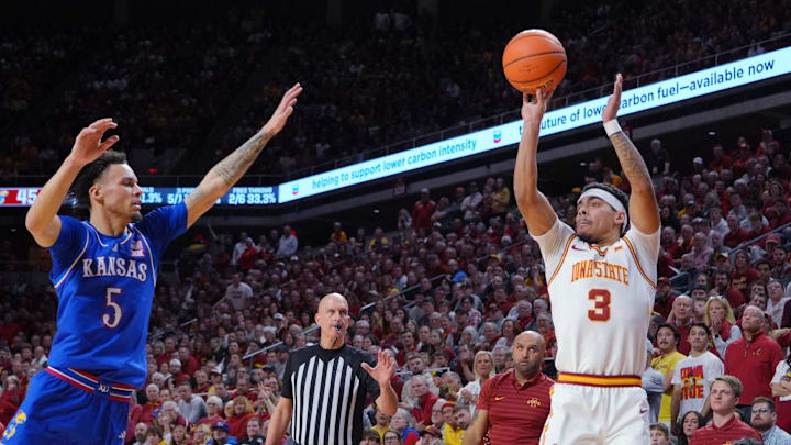Iowa State Cyclones guard Tamin Lipsey (3) takes a three-point shot over Kansas Jayhawks guard Zeke Mayo (5) during the second half in the Big-12 men’s basketball showdown at Hilton Coliseum on Wednesday, Jan. 15, 2025 in Ames, Iowa.