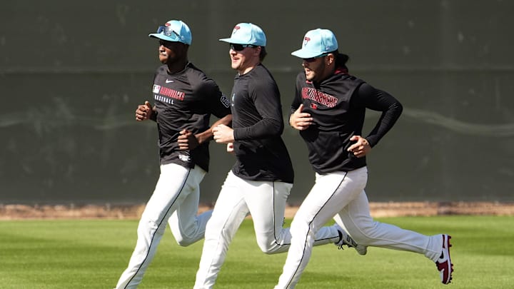 Arizona Diamondbacks Kristian Robinson, Jake McCarthy, and Eugenio Su‡rez (right) during spring training workouts at Salt River Fields at Talking Stick on Feb. 18, 2025, in Scottsdale.