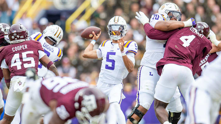 LSU quarterback Jayden Daniels looks to throw during his team's game against Texas A&M in Tiger LSU quarterback Jayden Daniels looks to throw during his team's game against Texas A&M in Tiger