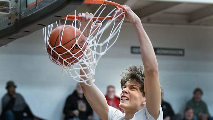 Green s Nikola Bundalo dunks against McKinley on Friday, Feb. 3, 2023.
Mckinley Green Boys Basketball 002 Green s Nikola Bundalo dunks against McKinley on Friday, Feb. 3, 2023.
Mckinley Green Boys Basketball 002