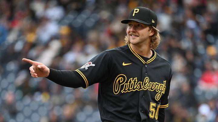 May 2, 2026; Pittsburgh, Pennsylvania, USA;  Pittsburgh Pirates starting pitcher Carmen Mlodzinski gestures to center fielder Oneil Cruz after making a catch against the Cincinnati Reds to end  the fourth inning at PNC Park. Mandatory Credit: Philip G. Pavely-Imagn Images