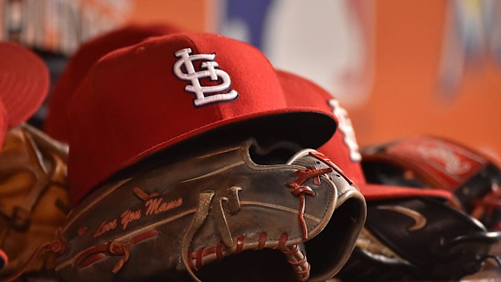 Jul 29, 2016; Miami, FL, USA; A detailed view of a hat and glove in the dugout of the St. Louis Cardinals in the game against the Miami Marlins at Marlins Park. The Cardinals defeated the Marlins 11-6. Mandatory Credit: Jasen Vinlove-Imagn Images Jul 29, 2016; Miami, FL, USA; A detailed view of a hat and glove in the dugout of the St. Louis Cardinals in the game against the Miami Marlins at Marlins Park. The Cardinals defeated the Marlins 11-6. Mandatory Credit: Jasen Vinlove-Imagn Images