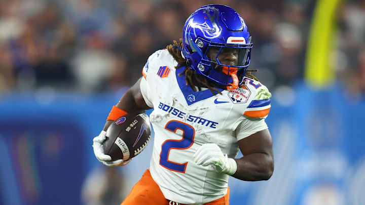 Dec 31, 2024; Glendale, AZ, USA; Boise State Broncos running back Ashton Jeanty (2) rushes the ball against the Penn State Nittany Lions during the first half in the Fiesta Bowl at State Farm Stadium. Mandatory Credit: Mark J. Rebilas-Imagn Images Dec 31, 2024; Glendale, AZ, USA; Boise State Broncos running back Ashton Jeanty (2) rushes the ball against the Penn State Nittany Lions during the first half in the Fiesta Bowl at State Farm Stadium. Mandatory Credit: Mark J. Rebilas-Imagn Images