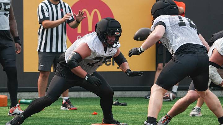 Oregon State's Tyler Voltin, left, does blocking drills during fall camp Aug. 5 at Reser Stadium in Corvallis. Oregon State's Tyler Voltin, left, does blocking drills during fall camp Aug. 5 at Reser Stadium in Corvallis.