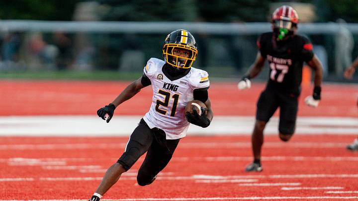 Detroit King’s Willie Walker (21) carries the ball against Orchard Lake St. Mary’s at St. Mary’s Preparatory High School in Orchard Lake on Friday, Sept. 4, 2026. Detroit King’s Willie Walker (21) carries the ball against Orchard Lake St. Mary’s at St. Mary’s Preparatory High School in Orchard Lake on Friday, Sept. 4, 2026.