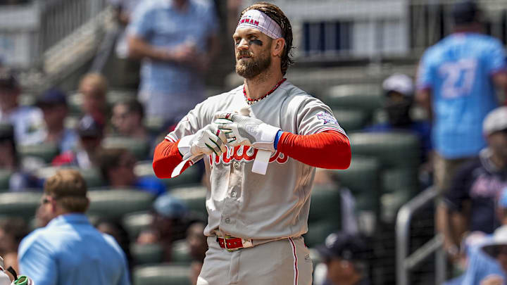 Apr 26, 2026; Cumberland, Georgia, USA; Philadelphia Phillies first baseman Bryce Harper (3) reacts after striking out against the Atlanta Braves during the third inning at Truist Park. 