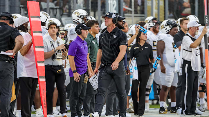 Aug 28, 2025; Orlando, Florida, USA; UCF Knights head coach Scott Frost walks the sideline during the first quarter against the Jacksonville State Gamecocks at Acrisure Bounce House. Mandatory Credit: Mike Watters-Imagn Images Aug 28, 2025; Orlando, Florida, USA; UCF Knights head coach Scott Frost walks the sideline during the first quarter against the Jacksonville State Gamecocks at Acrisure Bounce House. Mandatory Credit: Mike Watters-Imagn Images