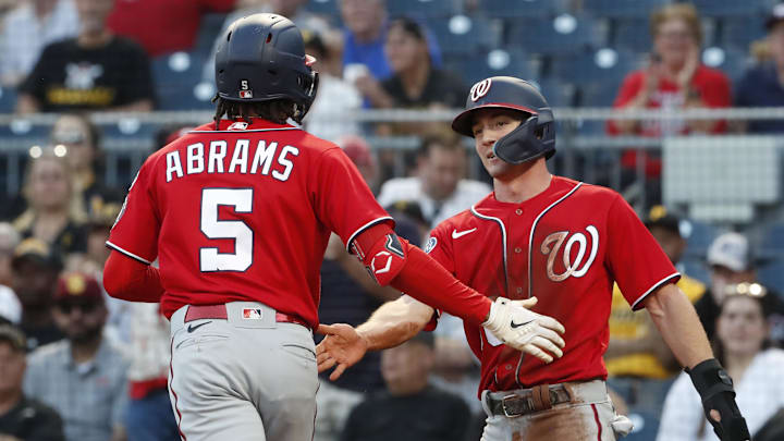 Sep 11, 2023; Pittsburgh, Pennsylvania, USA; Washington Nationals center fielder Jacob Young (right) greets shortstop CJ Abrams (5) at home plate after a two run home run against the Pittsburgh Pirates during the third inning at PNC Park. Sep 11, 2023; Pittsburgh, Pennsylvania, USA; Washington Nationals center fielder Jacob Young (right) greets shortstop CJ Abrams (5) at home plate after a two run home run against the Pittsburgh Pirates during the third inning at PNC Park.