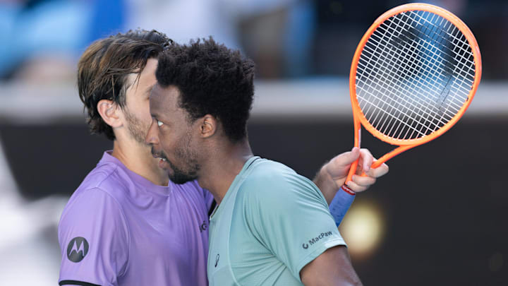 Gael Monfils (R) hugs Taylor Fritz after the men s singles 3rd round match between Taylor Fritz of the United States and Gael Monfils of France at Australian Open tennis tournament in Melbourne, Australia, Jan. 18, 2025. 