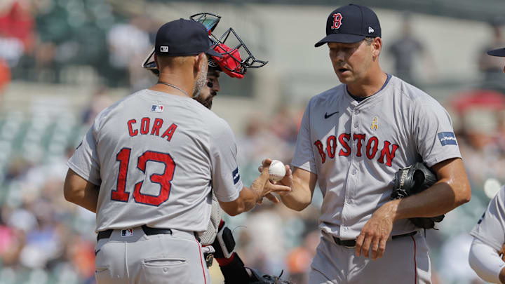 Sep 1, 2024; Detroit, Michigan, USA;  Boston Red Sox manager Alex Cora (13) take the ball to relieve Boston Red Sox pitcher Rich Hill (44) at Comerica Park. Mandatory Credit: Rick Osentoski-Imagn Images