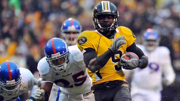 Nov 29, 2008; Kansas City, MO, USA; Missouri Tigers wide receiver Jeremy Maclin (9) goes in for a touchdown as Kansas Jayhawks safety Darrell Stuckey (25) is late on the coverage in the second half at Arrowhead Stadium. The Jayhawks won 40-37. Mandatory Credit: Denny Medley-Imagn Images Nov 29, 2008; Kansas City, MO, USA; Missouri Tigers wide receiver Jeremy Maclin (9) goes in for a touchdown as Kansas Jayhawks safety Darrell Stuckey (25) is late on the coverage in the second half at Arrowhead Stadium. The Jayhawks won 40-37. Mandatory Credit: Denny Medley-Imagn Images