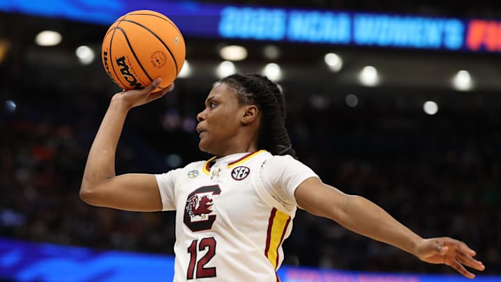 Apr 4, 2025; Tampa, FL, USA;  South Carolina Gamecocks guard MiLaysia Fulwiley (12) drives to the basket against the Texas Longhorns during the third quarter in a semifinal of the women's 2025 NCAA tournament at Amalie Arena. Mandatory Credit: Nathan Ray Seebeck-Imagn Images