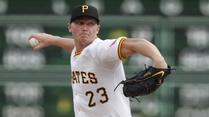 Aug 26, 2024; Pittsburgh, Pennsylvania, USA;  Pittsburgh Pirates starting pitcher Mitch Keller (23) delivers a pitch against the Chicago Cubs during the first inning at PNC Park. Mandatory Credit: Charles LeClaire-Imagn Images