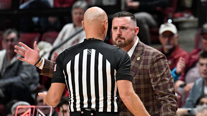 Feb 24, 2026; Tallahassee, Florida, USA; Florida State Seminoles head coach Luke Loucks exchanges words with a referee during the first half against the Miami Hurricanes at Donald L. Tucker Center. Mandatory Credit: Melina Myers-Imagn Images