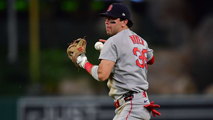 Jun 24, 2025; Anaheim, California, USA; Boston Red Sox second baseman Marcelo Mayer (39) loses control of the ball for the throw to first against Los Angeles Angels center fielder Jo Adell (7). during the seventh inning at Angel Stadium. Mandatory Credit: Gary A. Vasquez-Imagn Images